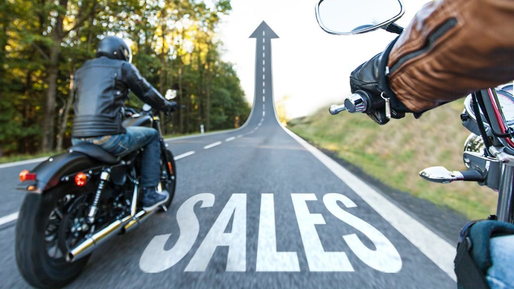 Motorcycles Riding UP a Street