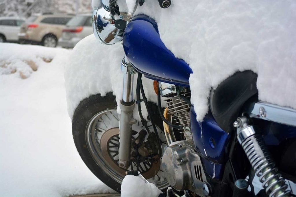 Blue Motorcycle with Snow