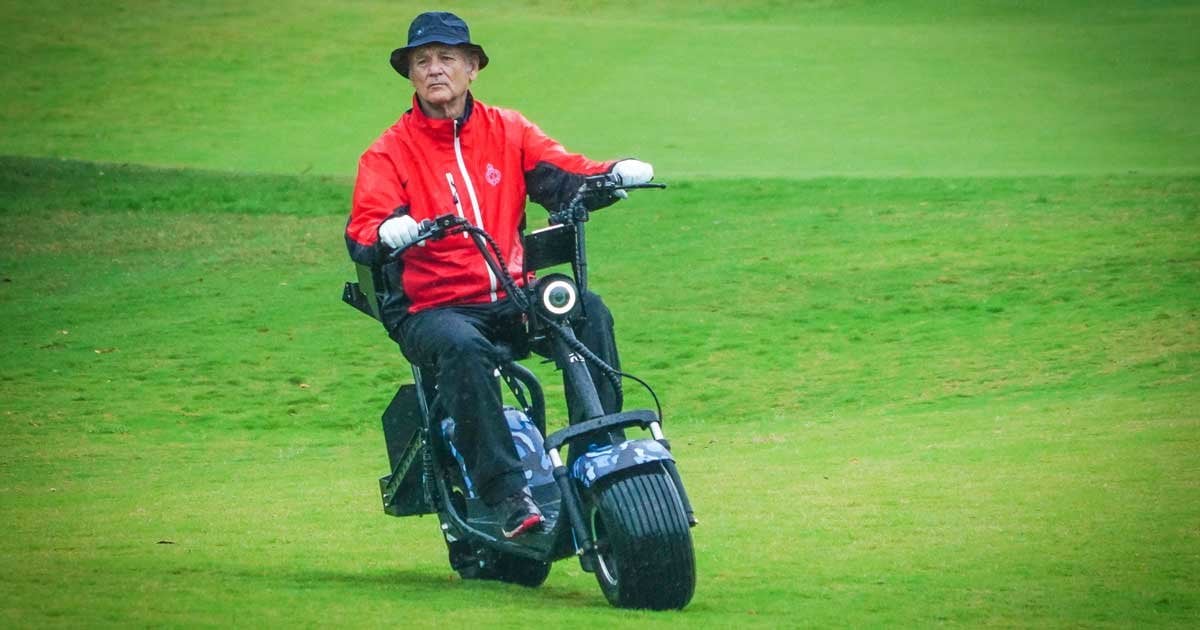 Bill Murray riding a Phat Scooter on the golf course