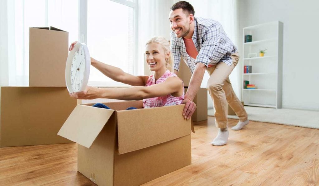 Man and Woman having fun while moving