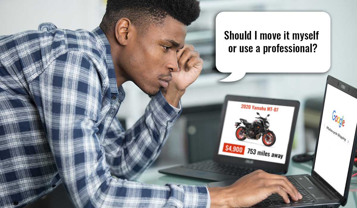 Man looking for motorcycle transport services online