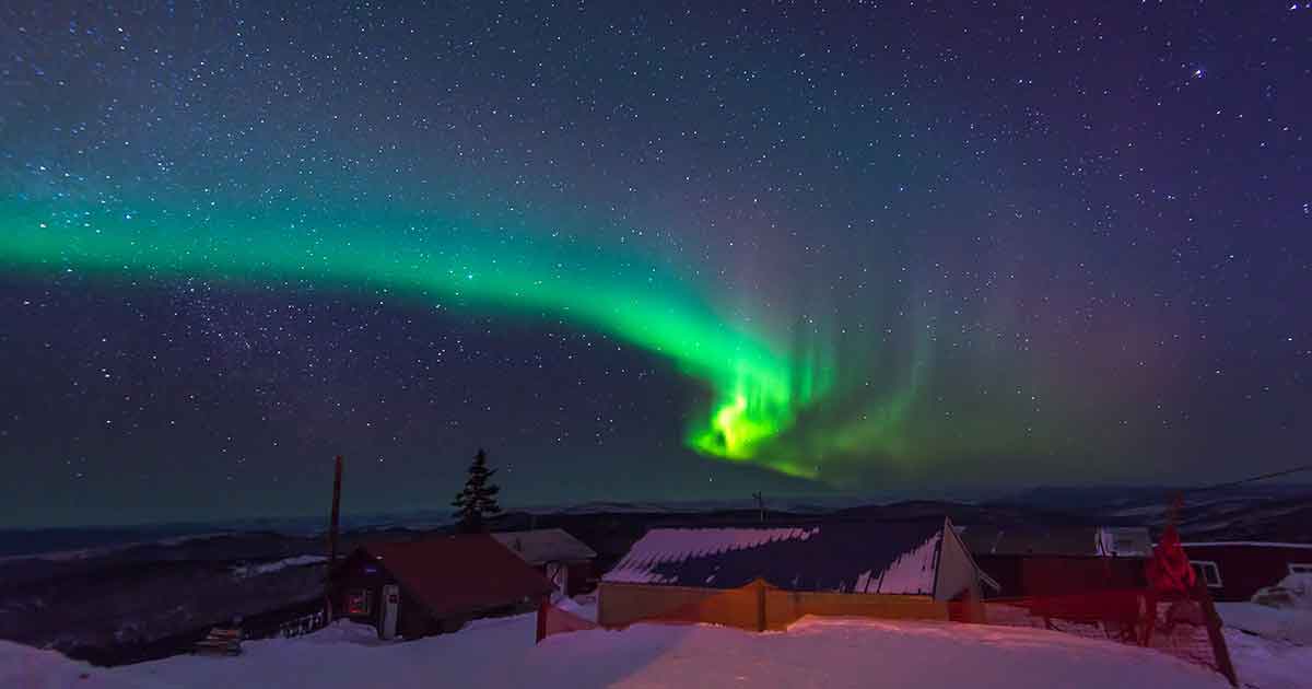 Fairbanks Alaska with Northern Lights overhead
