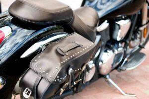 large leather Luggage bag on the back of the motorcycle. traveling motorcycle with chrome details